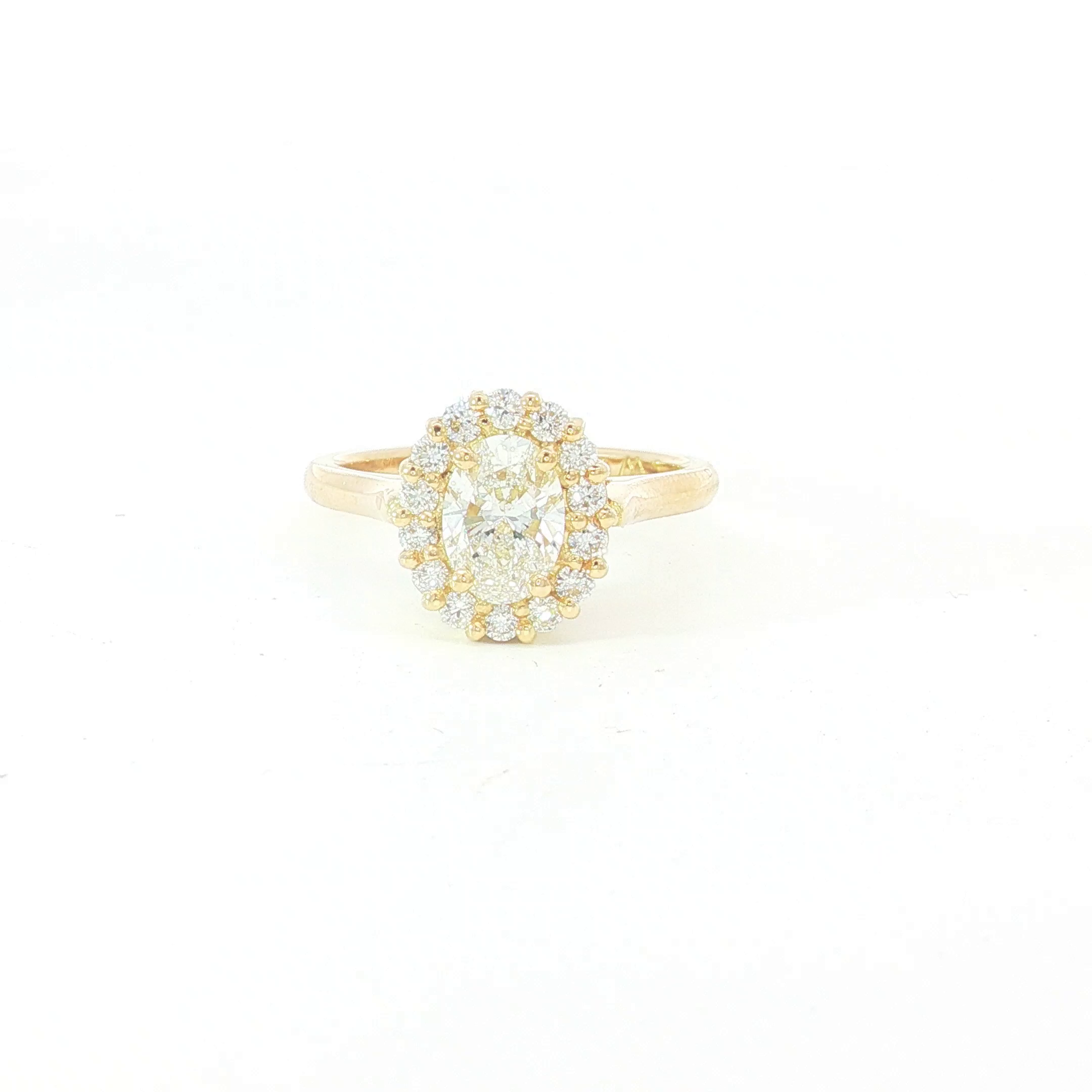 18ct YG Oval Diamond Halo Engagement Ring