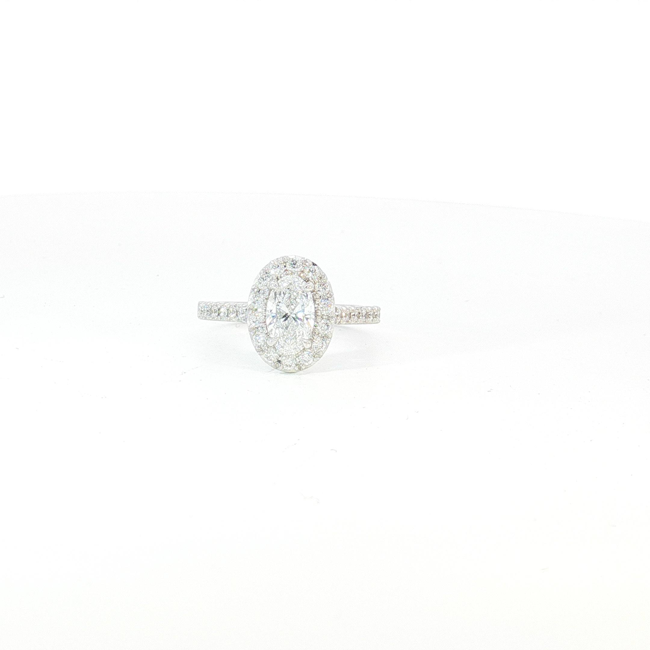 18ct WG Oval Diamond Halo Engagement Ring