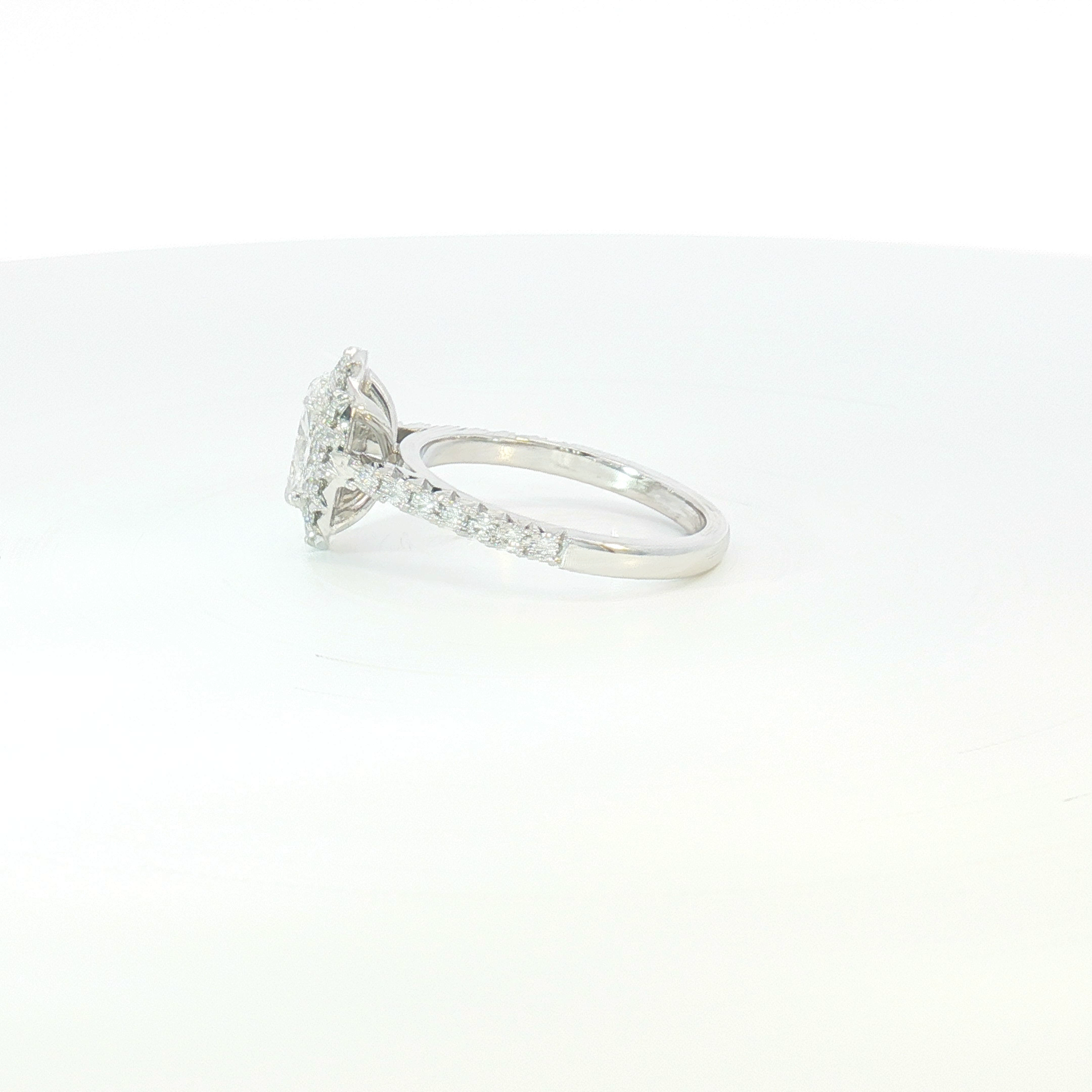 18ct WG Oval Diamond Halo Engagement Ring