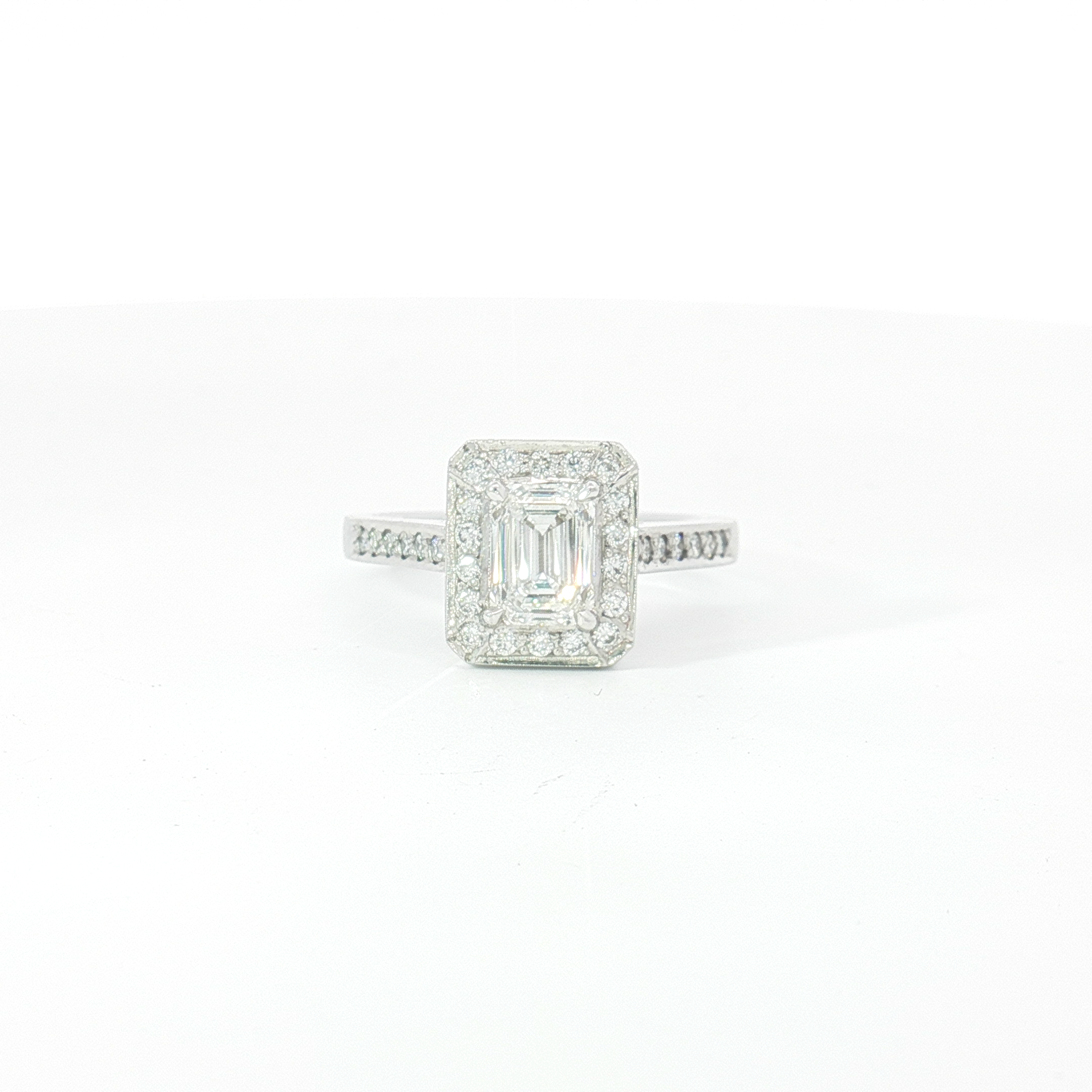 18ct WG Emerald Cut Diamond Halo Engagement Ring