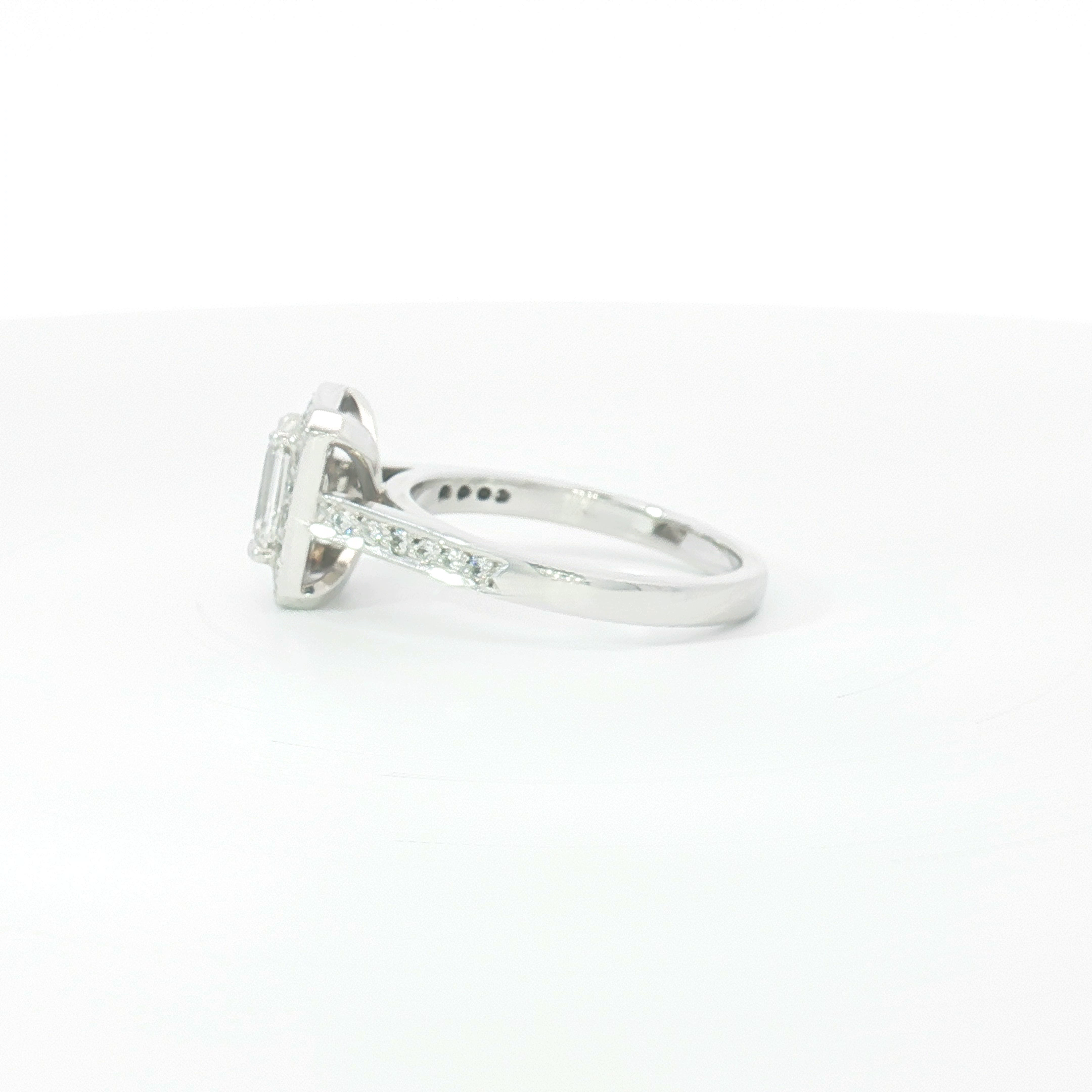 18ct WG Emerald Cut Diamond Halo Engagement Ring