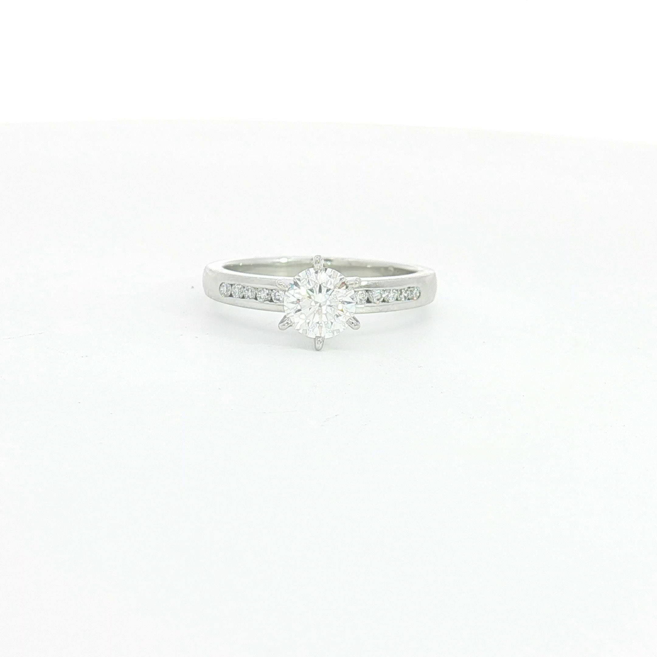 Platinum Diamond Engagement Ring with Stone-Set Shoulders