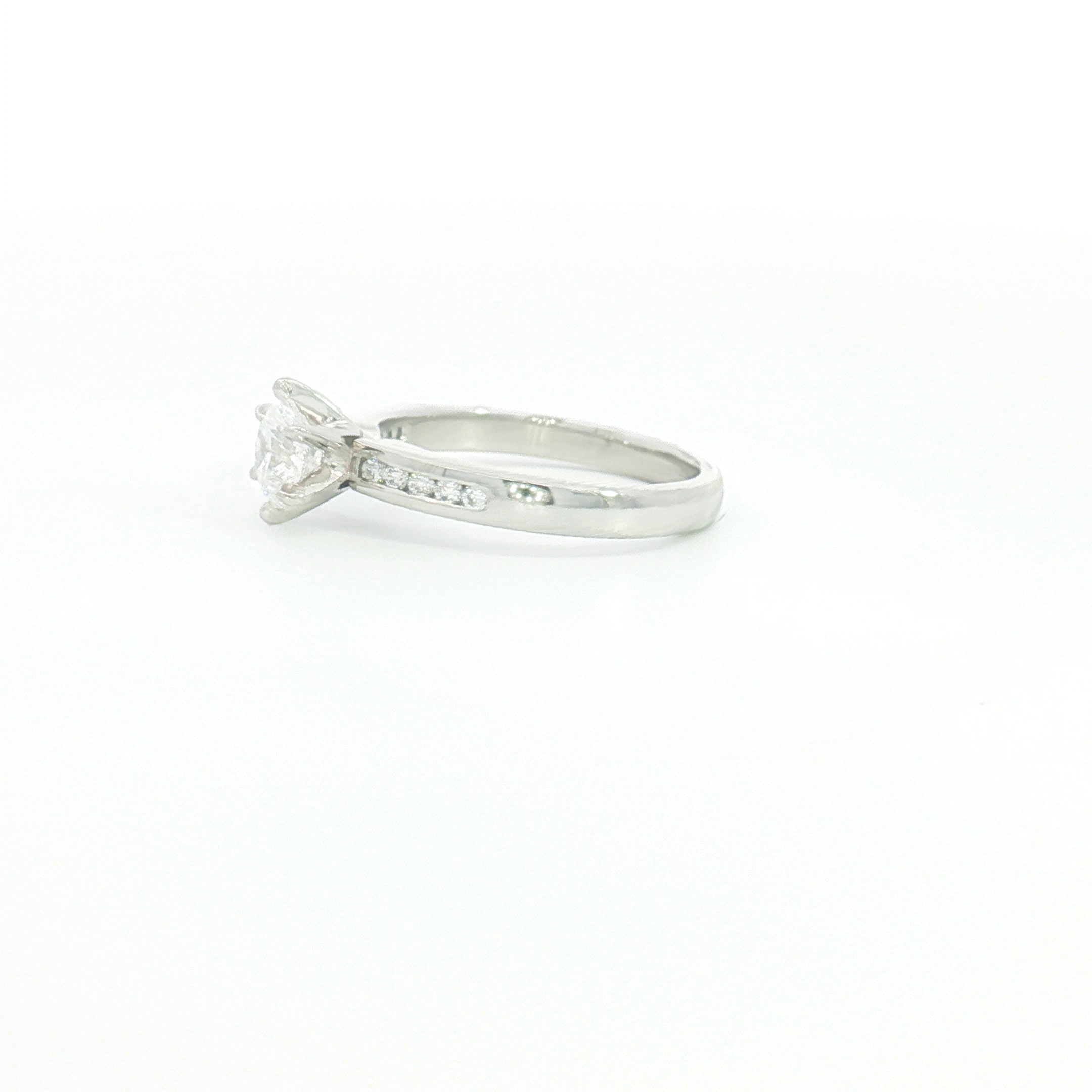 Platinum Diamond Engagement Ring with Stone-Set Shoulders