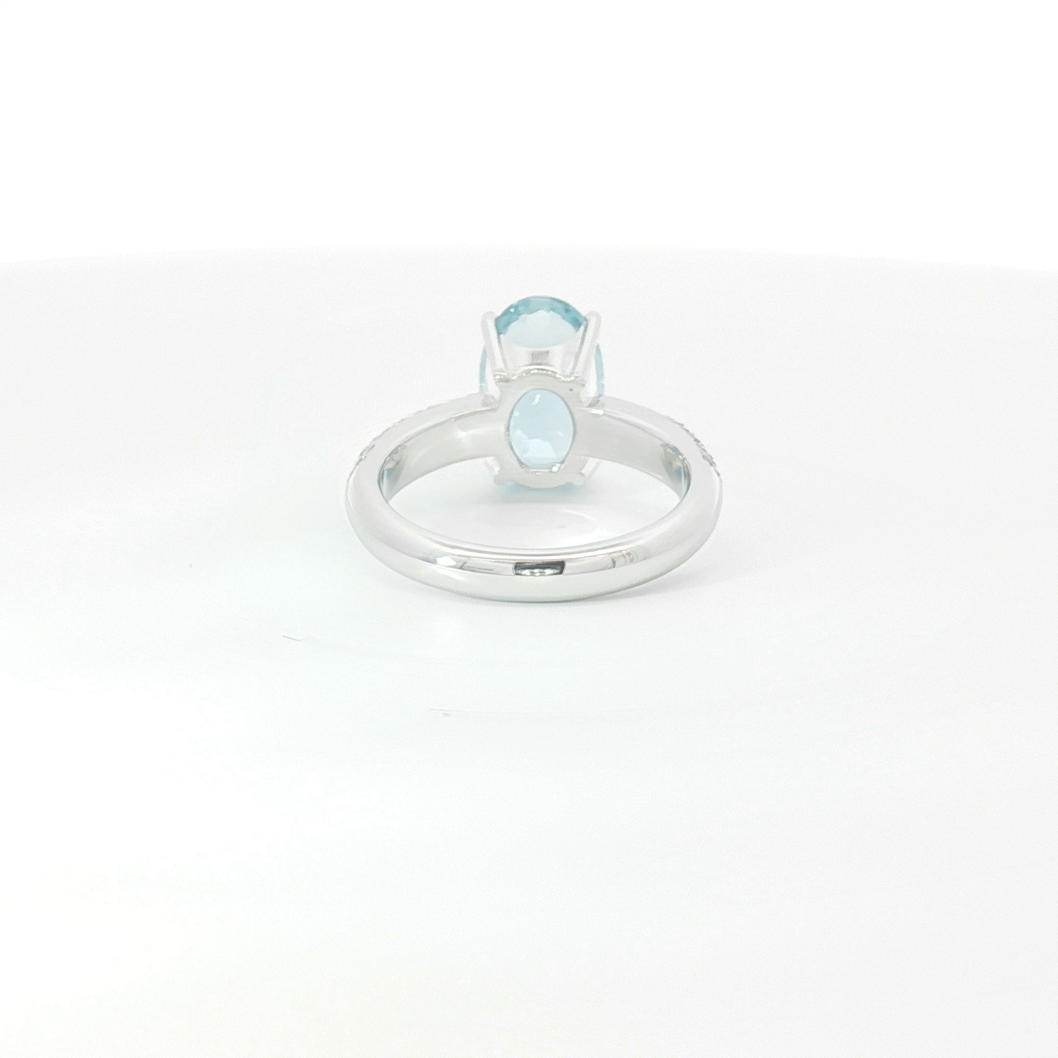 18ct WG Oval Aquamarine and Pavé Set Diamond Dress Ring