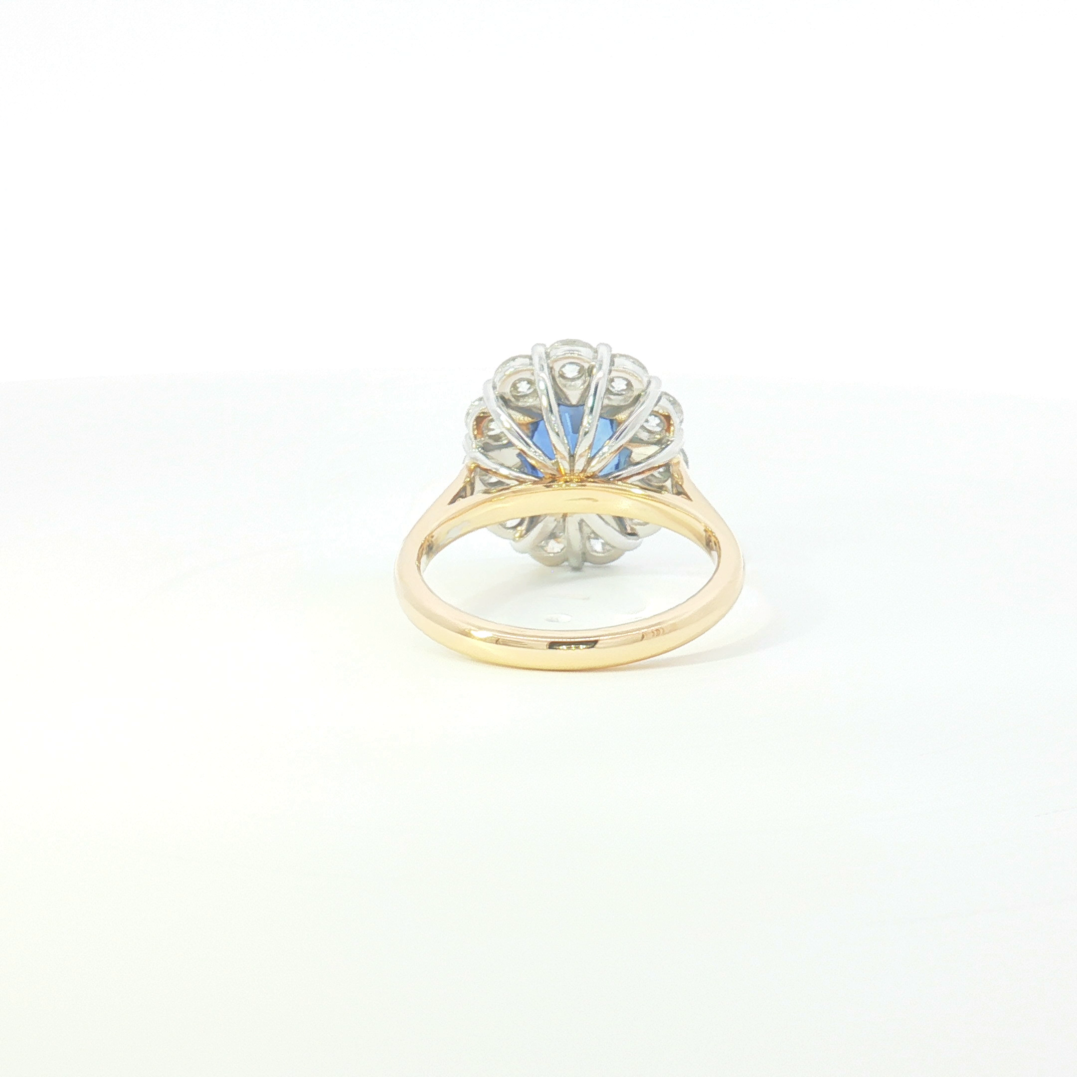 18ct 2Tone Sapphire and Diamond Halo Cluster Ring