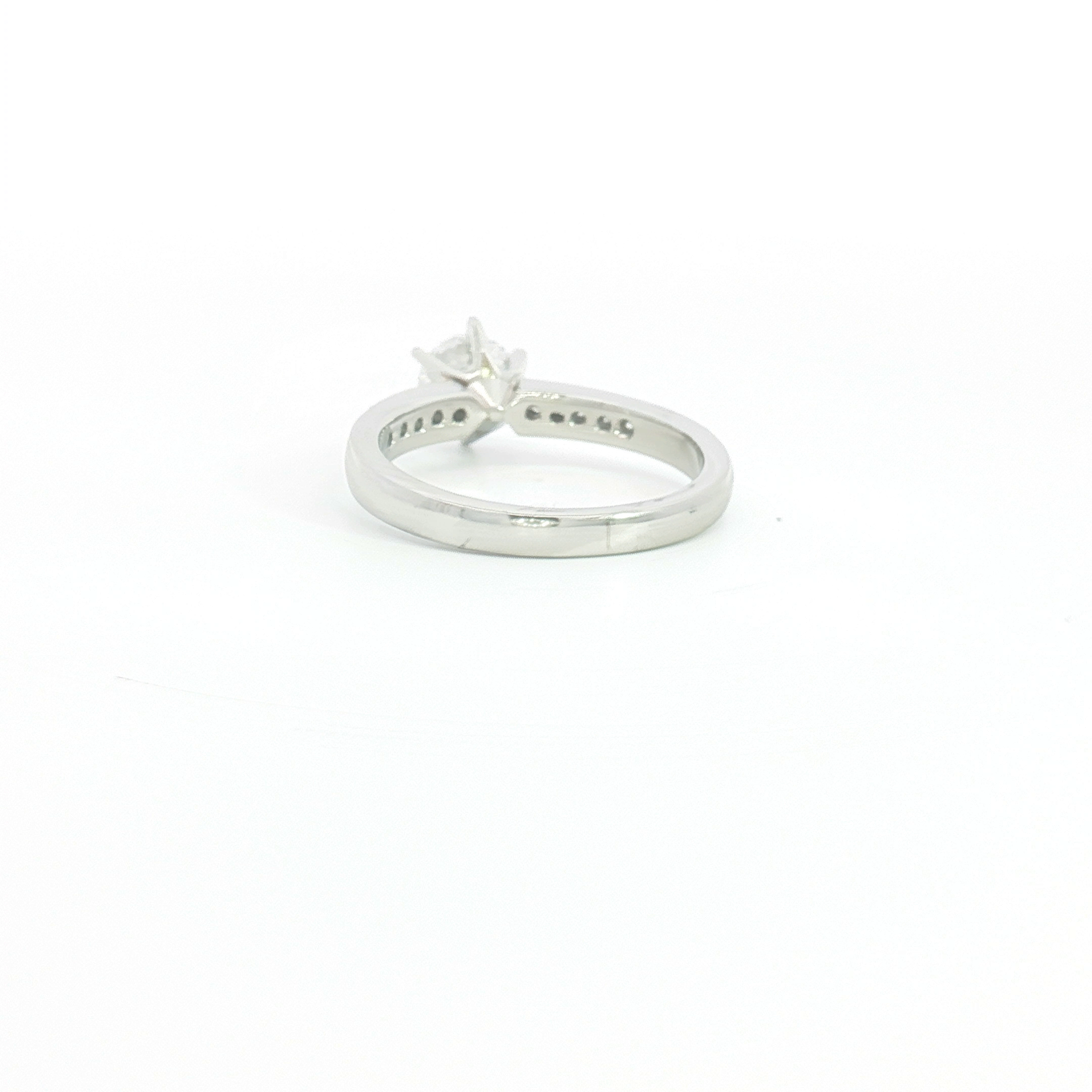 Platinum Diamond Engagement Ring with Stone-Set Shoulders
