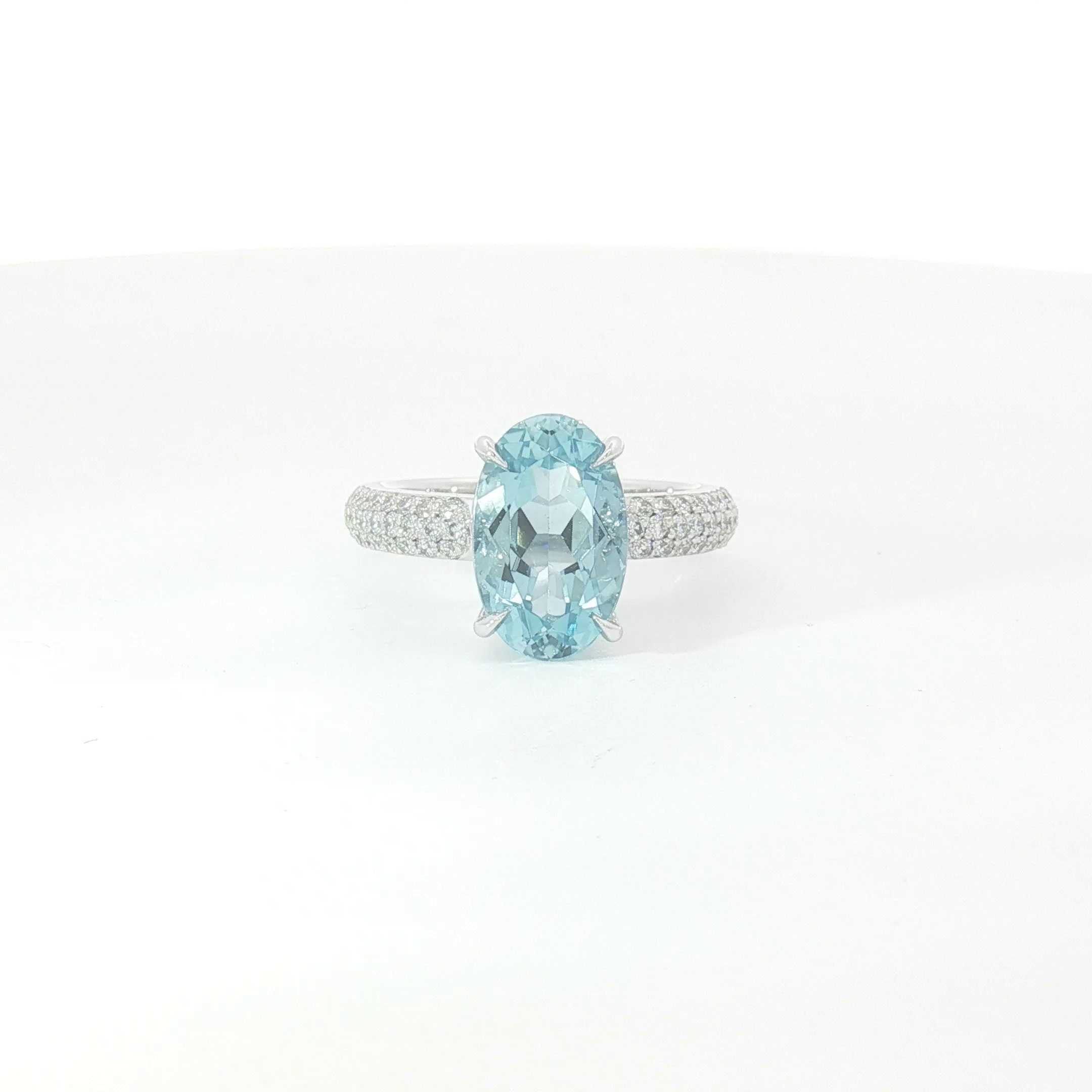 18ct WG Oval Aquamarine and Pavé Set Diamond Dress Ring