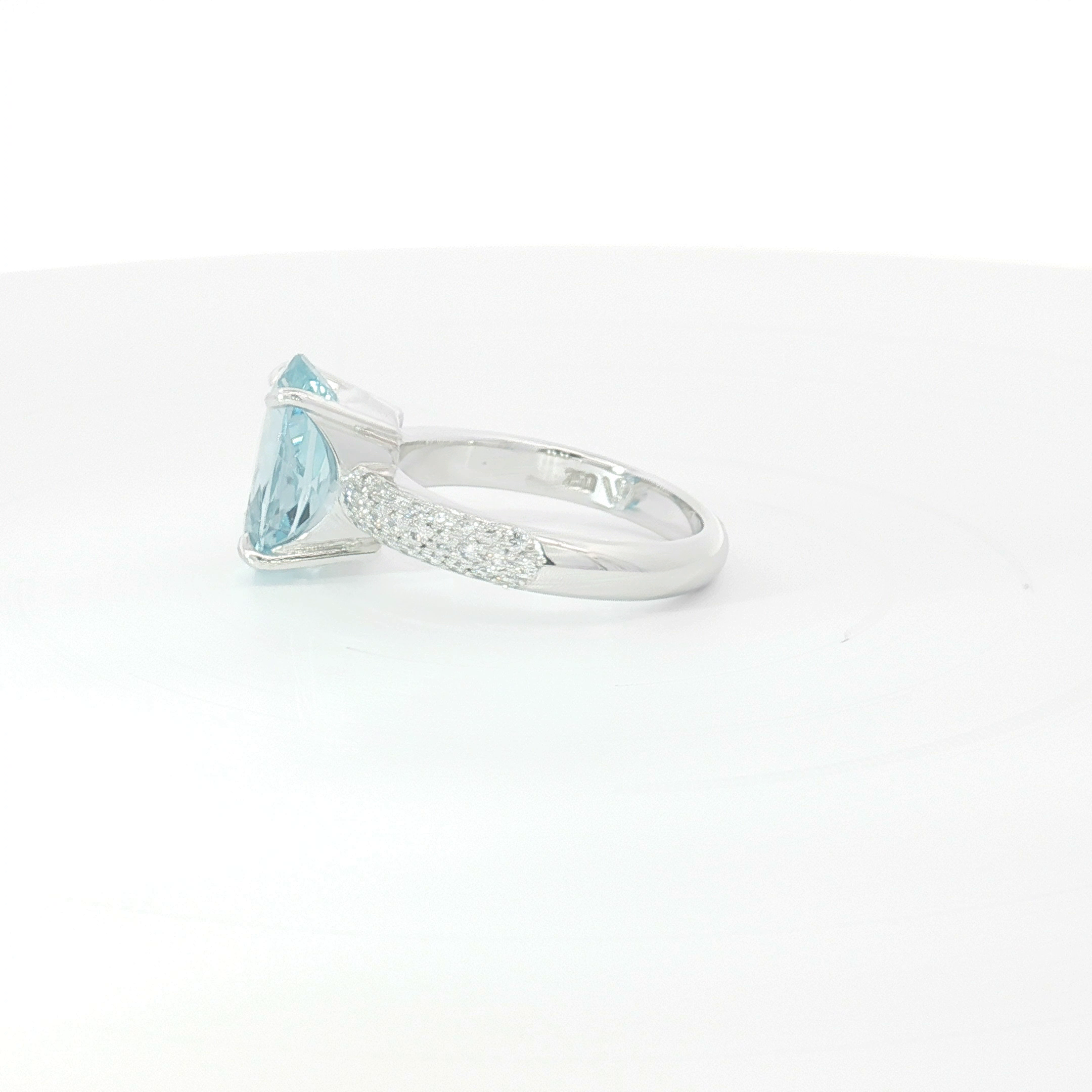18ct WG Oval Aquamarine and Pavé Set Diamond Dress Ring