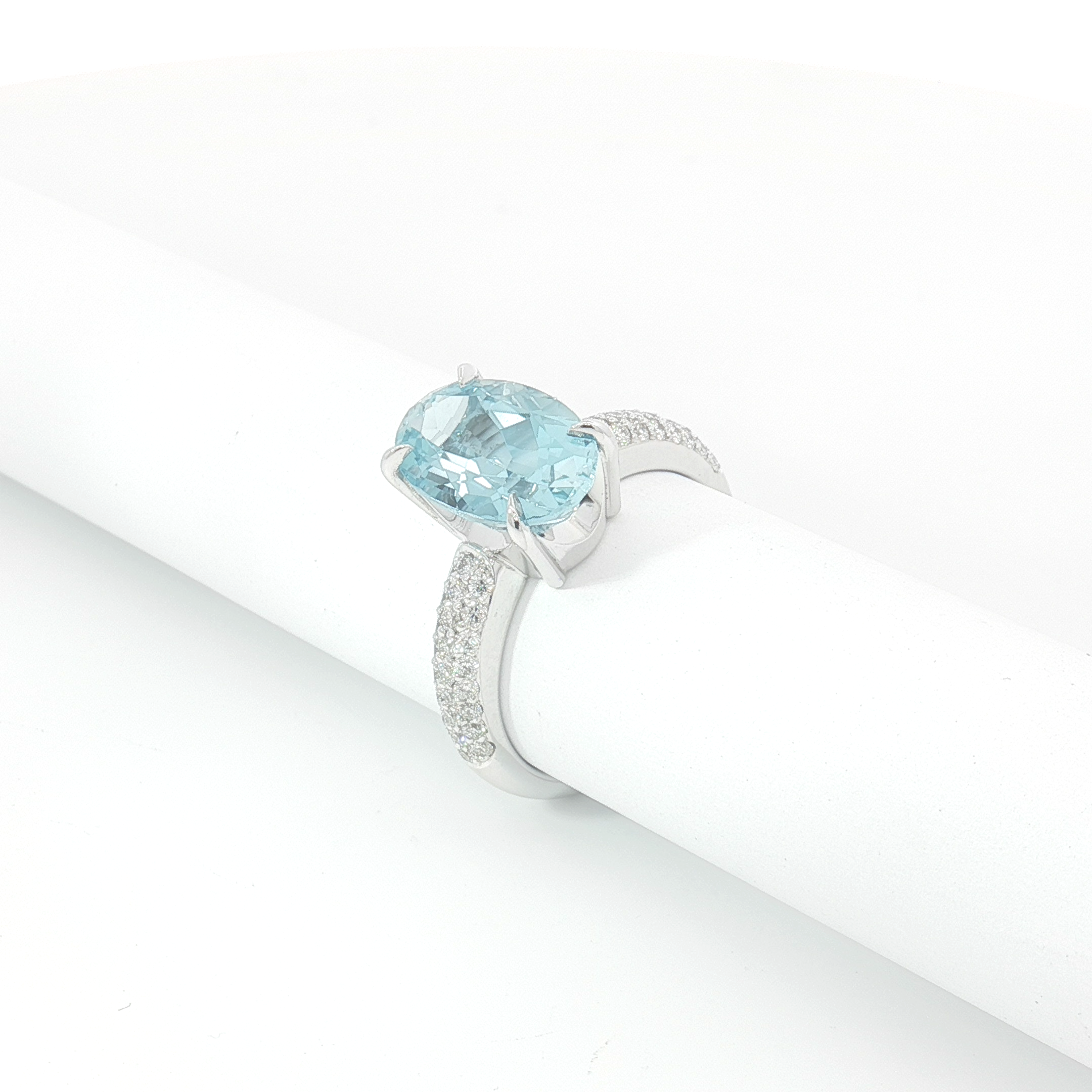 18ct WG Oval Aquamarine and Pavé Set Diamond Dress Ring