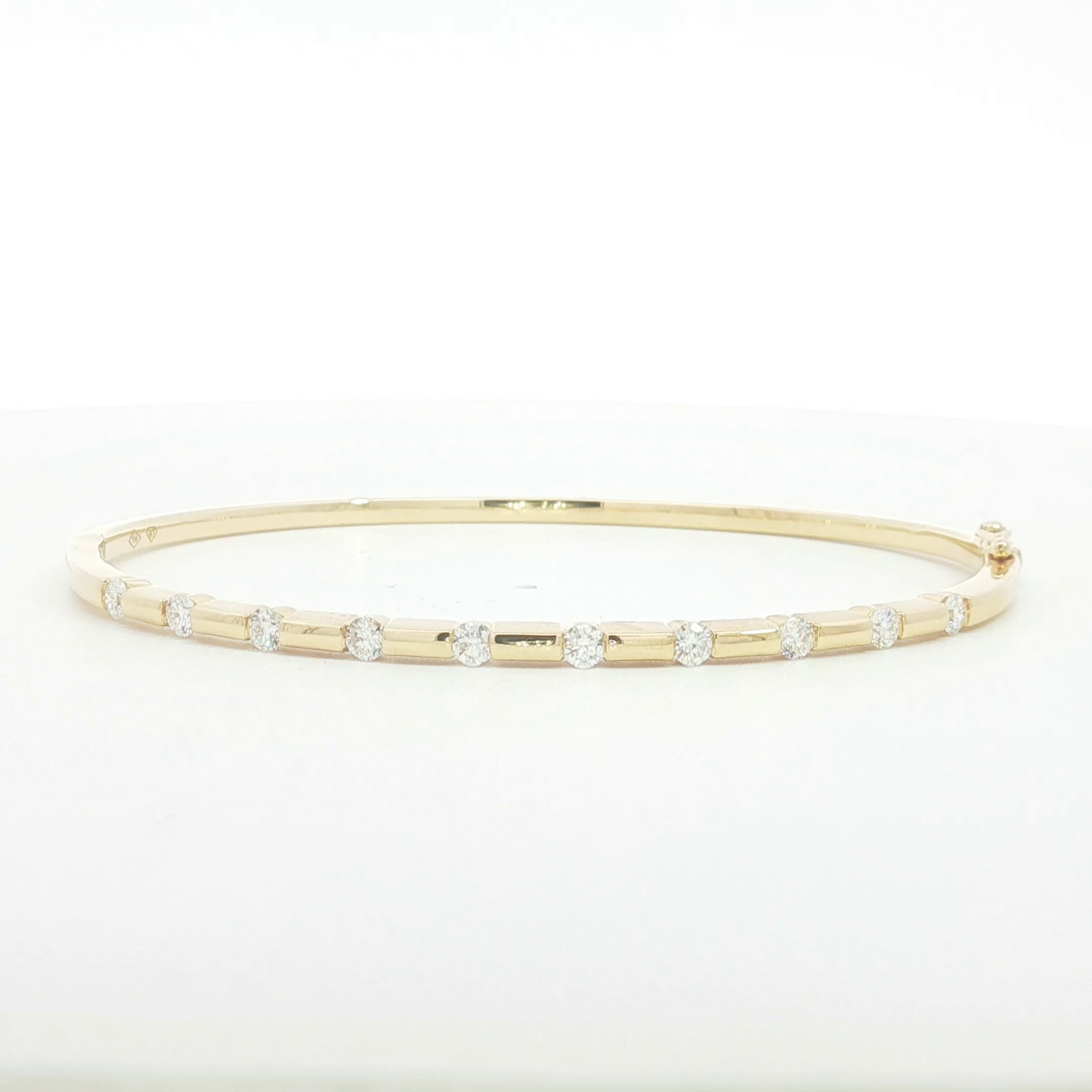 18ct YG 10 Diamond Bangle